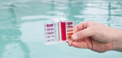 PH and chlorine analysis kit for swimming pools. Liquid chlorine and PH meter for swimming pools. photo