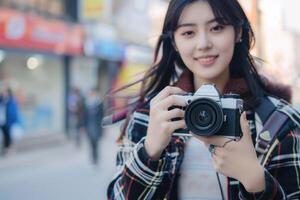 woman using camera in street . photo