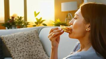 Woman Enjoying Pizza Slice at Home. video