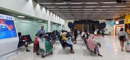 View of passengers activity and interior at terminal 1A Soekarno-Hatta International airport Jakarta, Indonesia - June 11 2024 photo