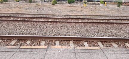 Atmosphere at railway train station. Local train activity in Indonesia. Railway road. Jakarta, Indonesia - Mei 28 2024 photo