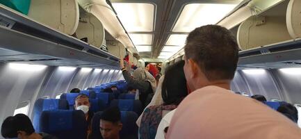 View of passengers activity and interior at terminal 1A Soekarno-Hatta International airport Jakarta, Indonesia - June 11 2024 photo