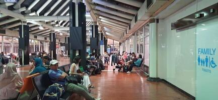 View of passengers activity and interior at terminal 1A Soekarno-Hatta International airport Jakarta, Indonesia - June 11 2024 photo