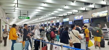 View of passengers activity and interior at terminal 1A Soekarno-Hatta International airport Jakarta, Indonesia - June 11 2024 photo