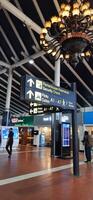 View of passengers activity and interior at terminal 1A Soekarno-Hatta International airport Jakarta, Indonesia - June 11 2024 photo