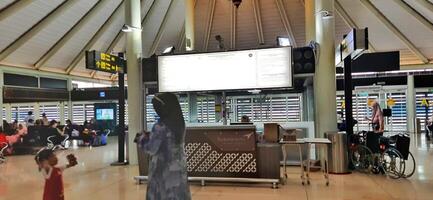 View of passengers activity and interior at terminal 1A Soekarno-Hatta International airport Jakarta, Indonesia - June 11 2024 photo