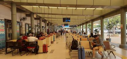 Atmosphere at railway train station. Local train activity in Indonesia. Railway road. Jakarta, Indonesia - Mei 28 2024 photo