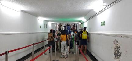 Atmosphere at railway train station. Local train activity in Indonesia. Railway road. Jakarta, Indonesia - Mei 28 2024 photo