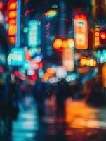 blurred image of a city street at night with neon lights photo