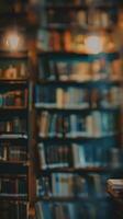 a blurry image of a book on a table in a library photo
