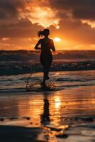 a woman running on the beach at sunset photo