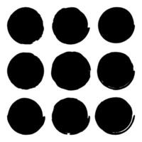 Set of circles grunge black stickers isolated on white background. A group of labels with uneven rough edges drawn with an ink brush. Design elements, 9 circle frames. Grunge backgrounds vector