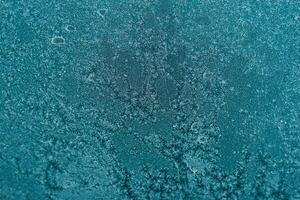 Frozen window. Texture, background for inserting text. New Year theme. photo
