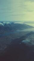 Beautiful landscape with cold sea and snowy mountains video