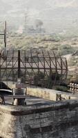 A serene forest scene captured within a protective fence video