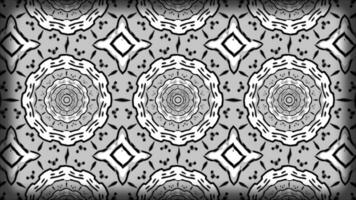 Kaleidoscope sequence with mandala patterns. Motion. Rows of changing shaped and flowers. video