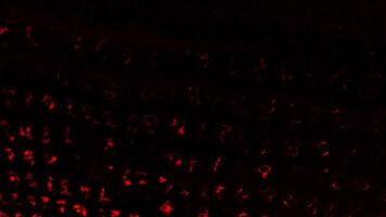 Red code appearing. Motion. Translucent numbers that are written in a line and blinking are made in 3D format. video