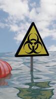 Concept of water pollution and ecology problems. Design. Barrels of fuel and biohazard sign above waving water surface. video