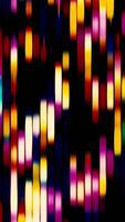 Flickering spots in vertical lines. Motion. Beautiful color spots shimmer in flow of lines. Lines with colored shimmering strokes and gradients. Retro animations with strokes video