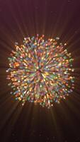 Round spherical object of many small glowing particles. Motion. Multicolored ball shrinking and disappearing on a black background. video