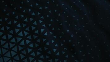 Black background.Motion.Dark triangles in animation make up patterns on a canvas that sways in the wind. video