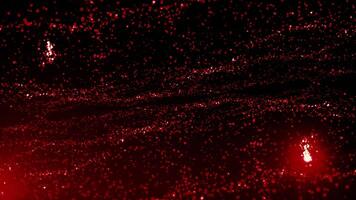 Black background.Design.Bright red and pink glitter in computer graphics moves in small particles in different directions on the footage video