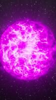 Black background. Motion.A white and pink magic ball in the middle of the background and next to which small stars fly in animation. video