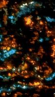 White and orange glow. Motion. Black background with 3d animation with bright sparkling highlights. video