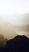 Fantastic autumn scenery surrounded by fog video