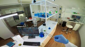 POV of technologist doing laboratory test examining sample, chemist holding tube with liquids inside. Scientist working with various bacteria tissue and DNA scan image, examining vaccine evolution video