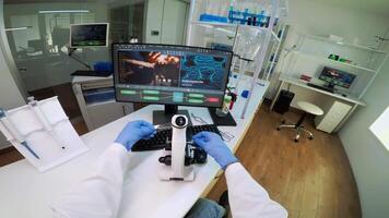 FPV of biotechnology scientist researching in laboratory using microscope analysing various bacteria. Chemist examining virus evolution using high tech for scientific research of vaccine development video