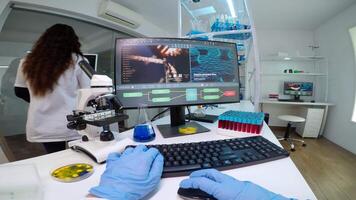 POV of scientists team worried about virus evolution discussing in modern equipped laboratory. Medical stuff examining vaccine development using high tech researching treatment against covid19 virus video