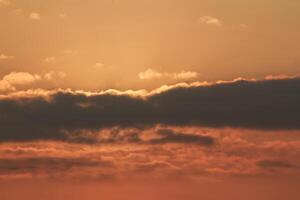 Close up view of sun hidden behind clouds photography photo