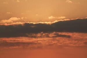 Close up view of sun hidden behind clouds photography photo