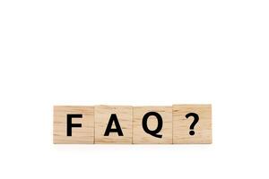 Wooden blocks with FAQ text isolated on white background. wooden blocks with the word FAQ frequently asked questions. Copy space and Clipping path. photo