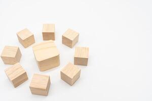 Wooden cube or wooden blocks on isolated background. Pile of wood block. Copy, empty space for text. photo
