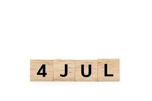 4 JUL wooden blocks isolated on white background. copy space and clipping path. photo