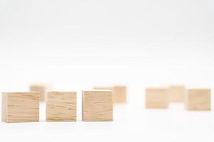 Wooden cube or wooden blocks on isolated background. Pile of wood block. Copy, empty space for text. photo
