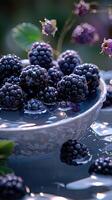 Close-up of fresh blackberries in a ceramic bowl with water droplets, capturing the essence of a refreshing summer harvest. photo