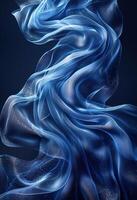 Elegant abstract blue silk waves gracefully flowing against a dark background, creating a dynamic and ethereal visual effect. photo