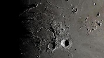 Moon surface close-up. Detailed lunar craters on the surface of the moon. Moon surface background. photo