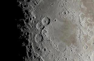 Moon surface close-up. Detailed lunar craters on the surface of the moon. Moon surface background. photo