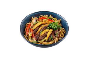 Udon noodles with beef and vegetables for the menu, website, restaurant or food delivery photo