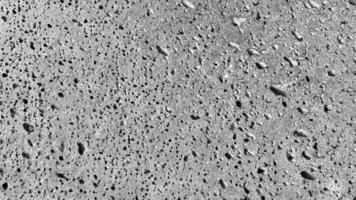 Gray stone with rough texture, abstract grunge background photo
