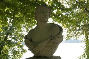 Trakai, Lithuania - September 13th 2023 - Sculpture of a man in park - Uzutrakis Manor, Tyszkiewicz family residence photo