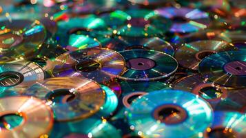 Colorful stack of CDs in a chaotic pile photo