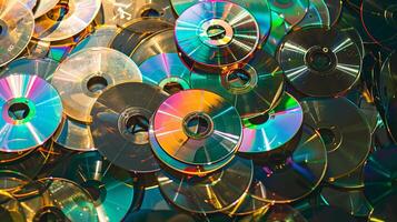 Colorful stack of CDs in a chaotic pile photo