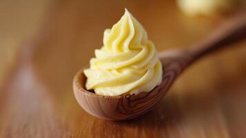 Creamy Butter Swirl on Wooden Spoon photo