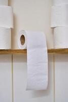 Pile of toilet paper in wc photo