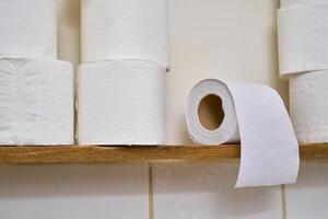 Pile of toilet paper in wc photo